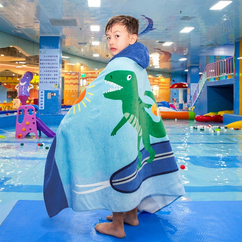 Prosop de baie copii tip poncho, culoare albastru, model cu dinozaur surfer verde, 127x76cm